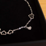 Felizmoda Silver bracelet with black heart And Red Roses Bag