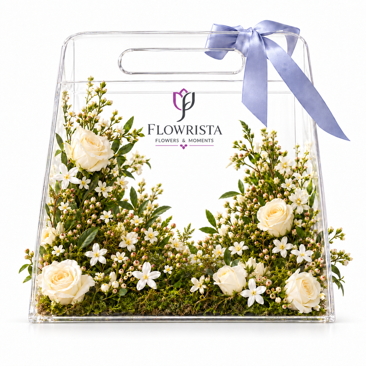 Flowrista white rose arrangement in acrylic gift tote with periwinkle bow