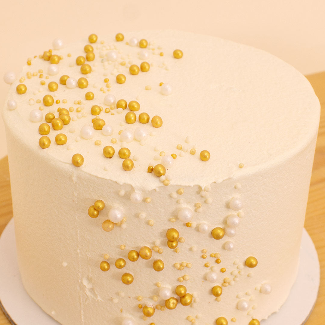 Ninos Golden Celebrations Cake & 20 Red Roses