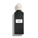 Black carbon diamond perfume bottle on a white background