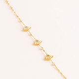 GUESS Fan Gold-Tone Charm Bracelet & Red Roses Bouquet