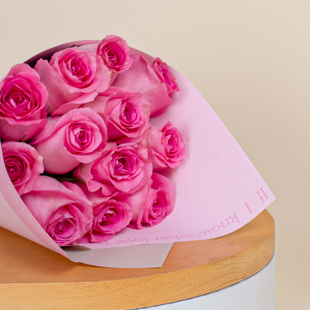 Hand Bouquet of 12 Pink Roses