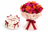 A birthday gift set featuring a round white frosted cake with red icing and a large bouquet of red, pink, and orange roses wrapped in pale pink paper with a dark red ribbon, on a white background.