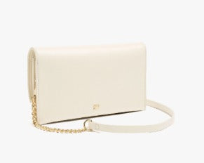 A cream-colored leather clutch bag with a gold chain strap and a small gold logo on the front, set against a plain white background.
