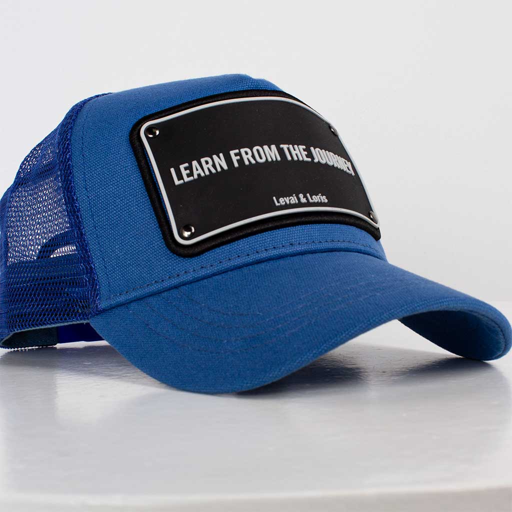 Levai & Loris Learn From The Journey unisex cap