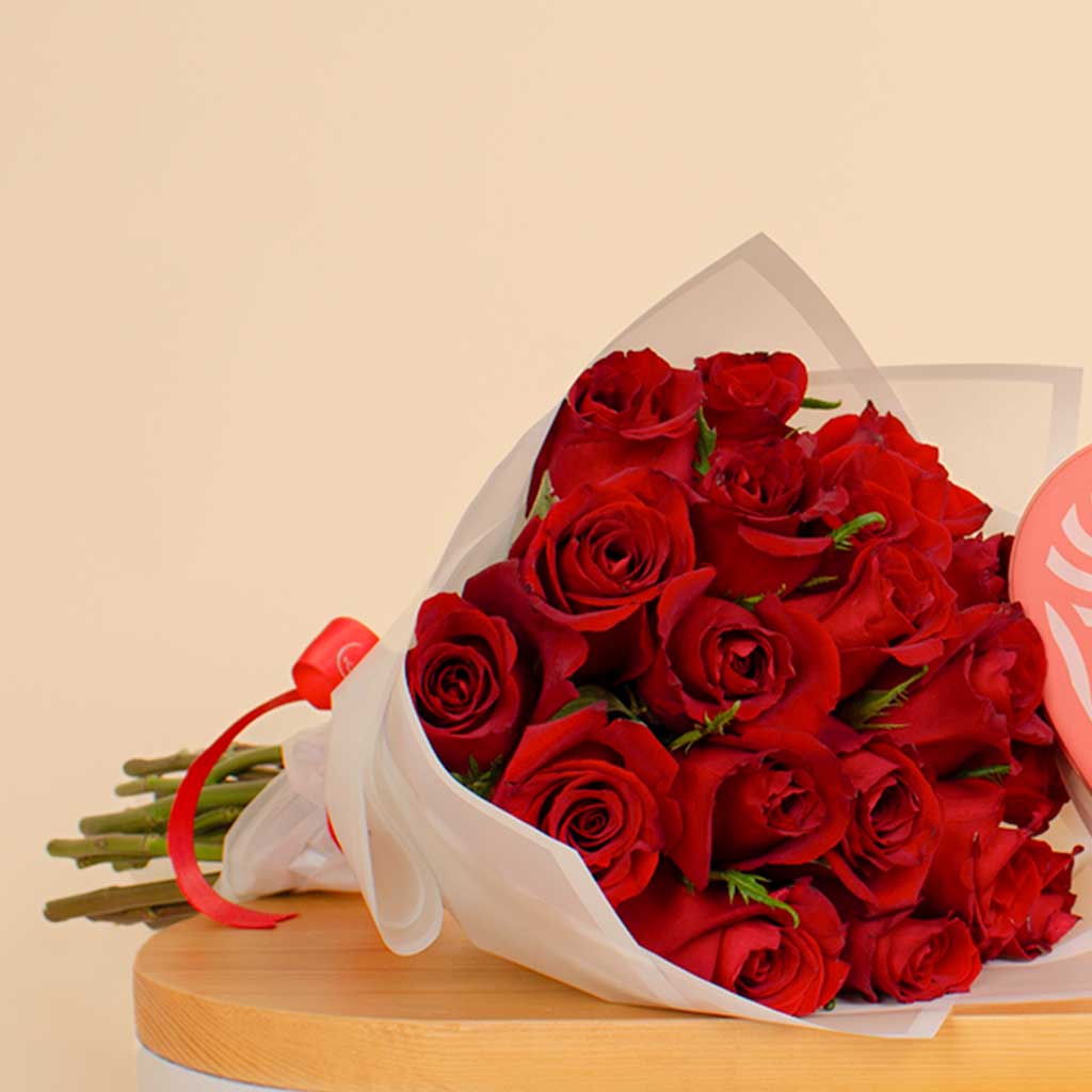 Patchi Tin Box of 22 Pieces and 20 red roses