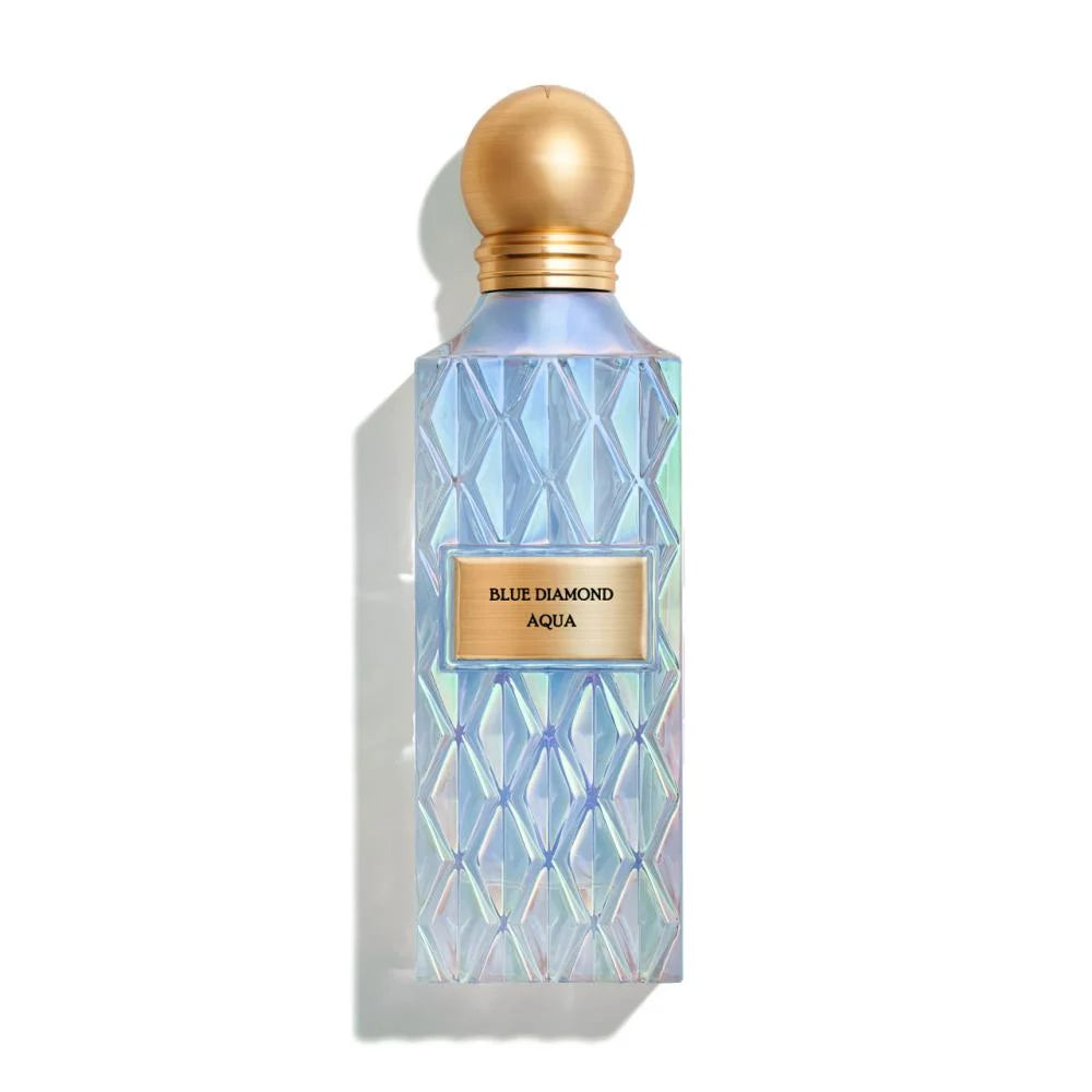 Perfume bottle with geometric design and gold cap on a white background