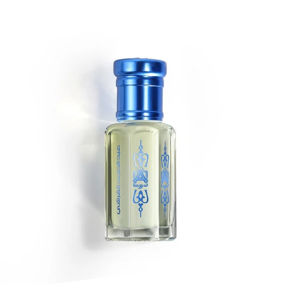 Perfume bottle with blue cap and decorative label on a white background