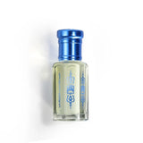 Perfume bottle with blue cap and decorative label on a white background