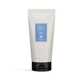 A tube of Al Mahmoud Body Lotion with a black cap, featuring a cream-colored body with a light geometric pattern and a central light blue label.