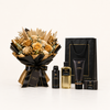 A luxury gift set featuring a dried flower bouquet in black and gold wrapping, alongside a black shopping bag and skincare products including a bottle, tube, and box labeled NOIR.