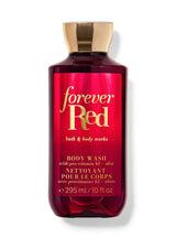 A bottle of Bath & Body Works Forever Red body wash, featuring a deep red label with gold lettering and a metallic gold cap, set against a plain white background.