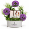 Shop Safari Body Musk Half Tola + 30ml Spray by Abdul Samad Al Qurashi with purple allium flowers in a Flowrista white tray. Luxury gift delivery in Dubai.
