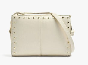 An off-white leather shoulder bag with gold-tone studs and a matching leather strap, shown against a plain white background.