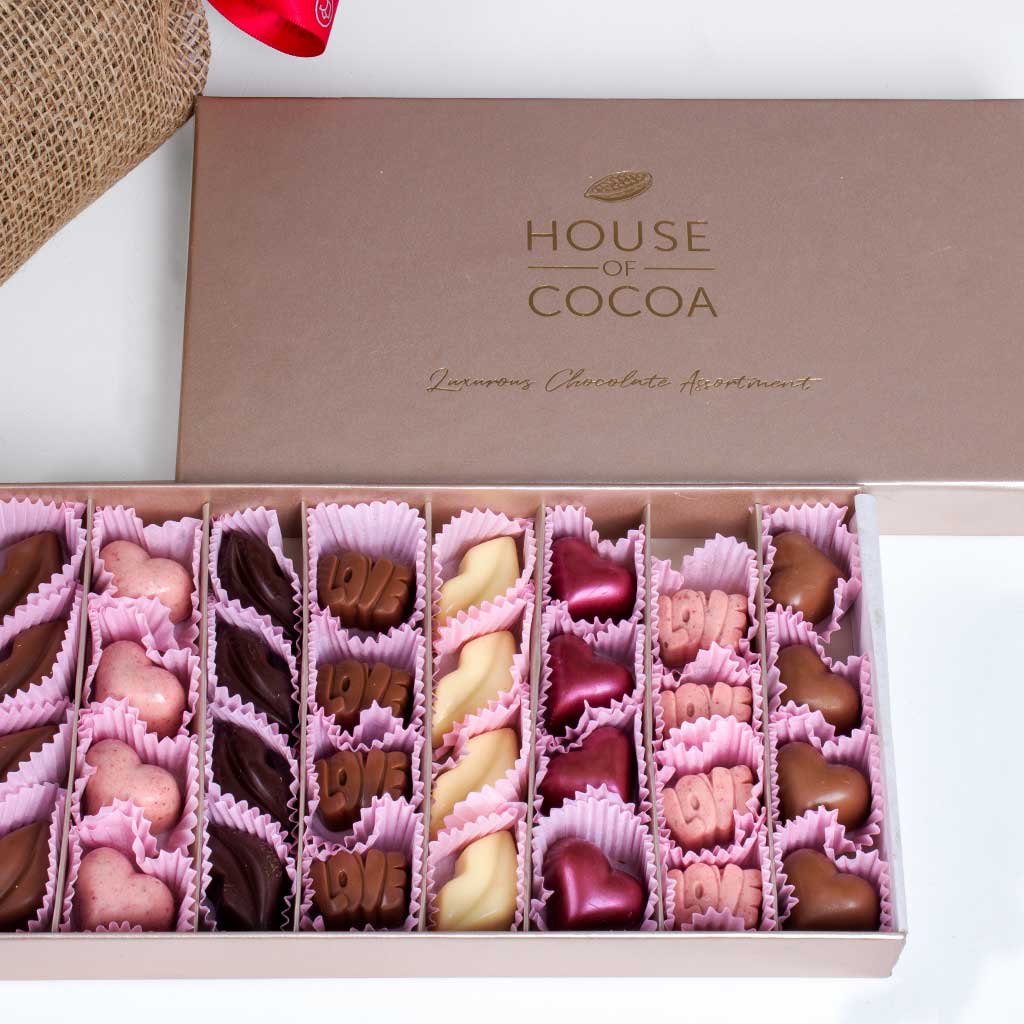 House of Cocoa Chocolate Box 32pieces and 20 red roses