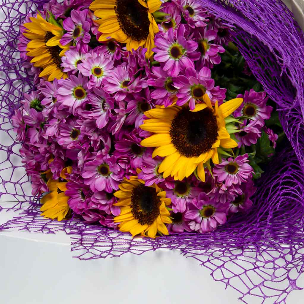 Vibrant Sunflowers & Regal Reagan Blooms