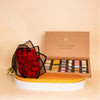 Chocolate Factory Luxe Box – 28 Pieces & Red Roses Boutque