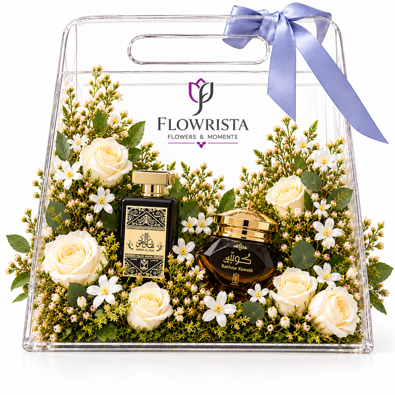Ashek Al Oud and Bakhoor Kuwati with fresh white roses in a clear Flowrista gift bag