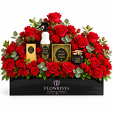 Kuwaiti perfume bakhoor and white air freshener with fresh red roses in a black Flowrista planter