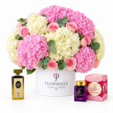 Kuwaiti perfume and Bakhoor Saher Alkalmet beside a Flowrista pink hydrangea and rose box