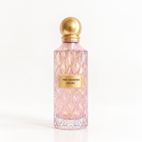 Pink Diamond Sakura pink faceted perfume bottle with gold-coloured spherical cap