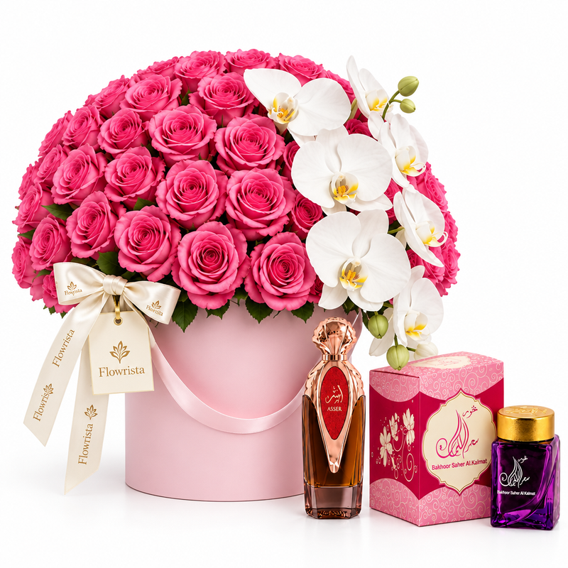 Asser perfume and Bakhoor Saher Alkalmet beside Flowrista pink roses and white orchids in a pink flower box