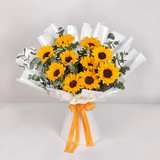 Flowrista sunflowers pop bouquet on white background