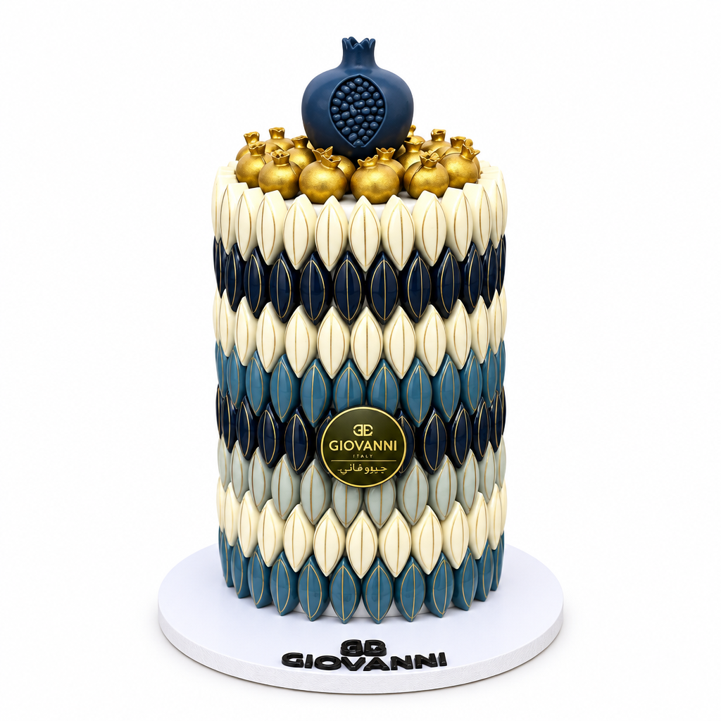Giovanni Khufu chocolate pyramid in blue, navy and white with gold decorations on a white base