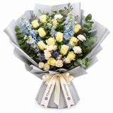 Flowrista cream rose bouquet with white and pale-blue flowers in gray wrapping