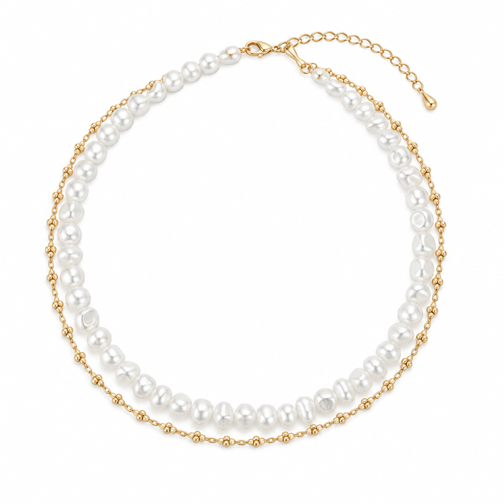 Pearl-style necklace with fine gold-tone chain on a white background