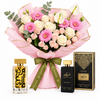Ambra Al Oud and Black Intense perfumes beside Flowrista pink gerberas cream roses and white anthuriums