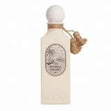 Riviera Sunset cream perfume bottle with rounded white cap and beige neck ornament