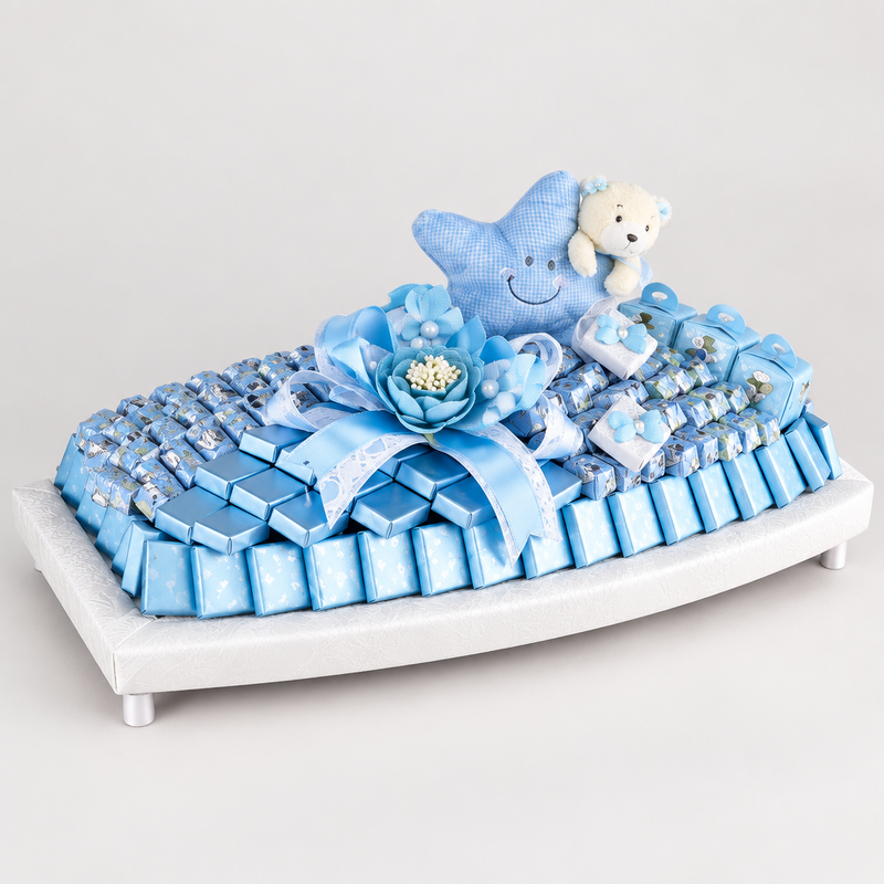 Le Boy Chocolates blue baby-themed chocolate tray on a white base