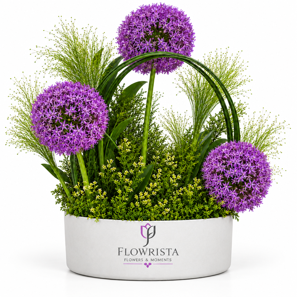 Artificial purple allium flowers and decorative greenery in a white oval Flowrista planter