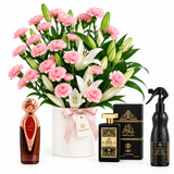 Asser and Ashek Al Oud perfumes with Ashiq Aloud air freshener beside Flowrista pink carnations and white lilies