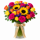Sunflowers and magenta yellow and orange roses in a glass vase with Flowrista ribbon