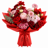 Flowrista red roses carnations pink gerberas and hydrangeas with eucalyptus in red wrapping