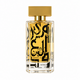 Amir Al Oud Gold perfume in a clear rectangular bottle with gold cap and black and gold calligraphy