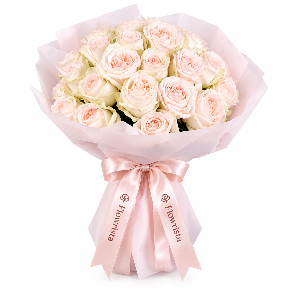 Blush and cream rose bouquet in pale pink wrapping with satin Flowrista bow