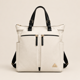 ALDO Ibiliwyr beige backpack with black handles twin front zips and triangular plaque