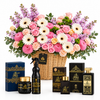 Asheq Al Oud perfume, Mamoul, Bakhoor and home air freshener beside a Flowrista pastel flower basket