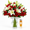 IBRAQ Confidence Dose Honey Musk bottle beside Flowrista red roses and white lilies in a glass vase