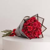 Flowrista 20 red roses bouquet in dark grey paper with red satin ribbon bow