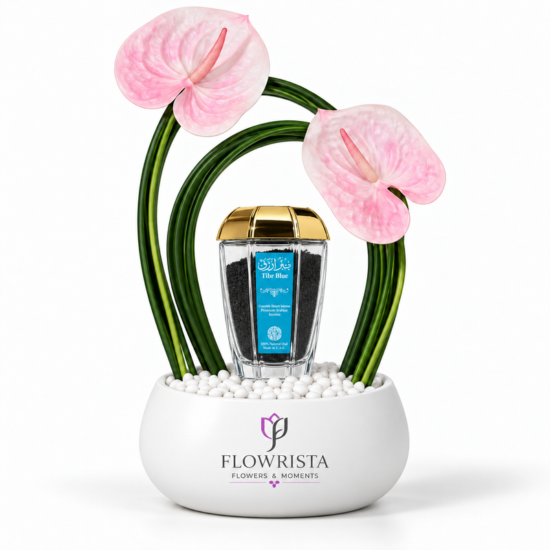 Tibr Blue incense by Abdul Samad Al Qurashi nestled inside Flowrista pink anthurium arrangement in a white ceramic bowl
