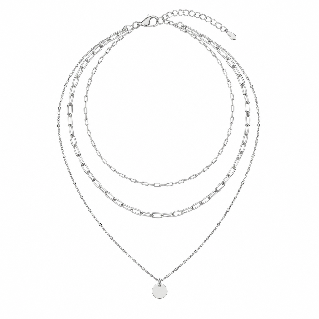 Silver-tone layered necklace with round pendant on white background