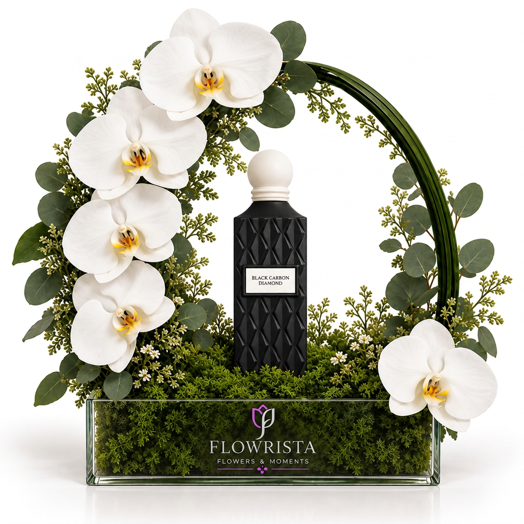 Black Carbon Diamond perfume framed by white orchids and a green leaf arch in a Flowrista glass planter