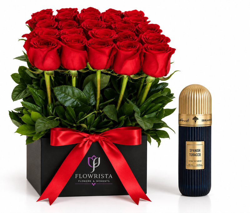 A gift set featuring a box of 24 red roses with green leaves and a large red ribbon, next to a bottle of Inghiltern Strawn Tobacco Flavouring.