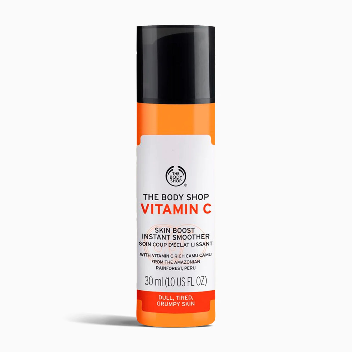 The Body Shop Vitamin C Skin Boost Instant Smoother in a 30 ml spray bottle, featuring a white label with orange and black accents on a light gray background.