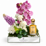 Gold Vanilla Body Oud perfume with pink orchids and floral tray by Flowrista