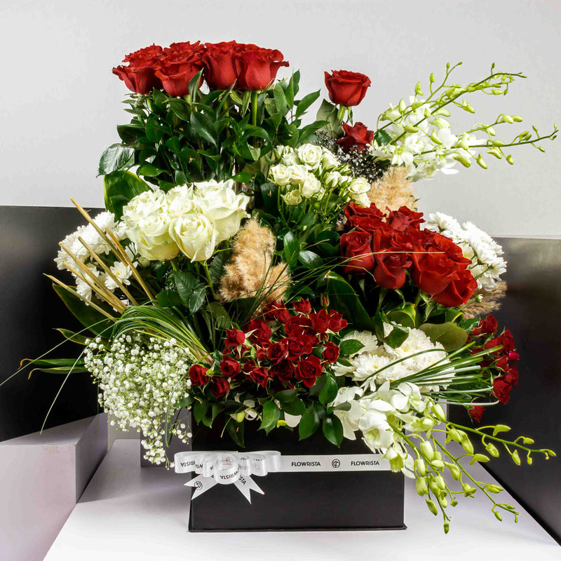 Flowrista Box with Roses & Baby Orchids